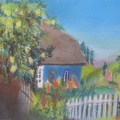 Haus an der See mit Quittenbaum